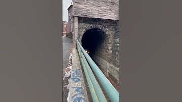 Train comes out of tunnel