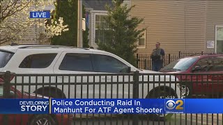 Police Conduct Raid In Search For Suspect Who Shot ATF Officer