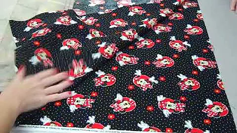 Getting the fabric on grain and pinning VID00011