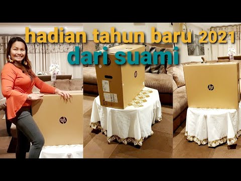 Video: Bagaimana Memilih Hadiah Asli Untuk Suami Anda Untuk Tahun Baru