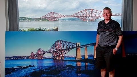 A room with TWO views! Granddad, 58, buys a 10ft picture identical to what he sees out of his