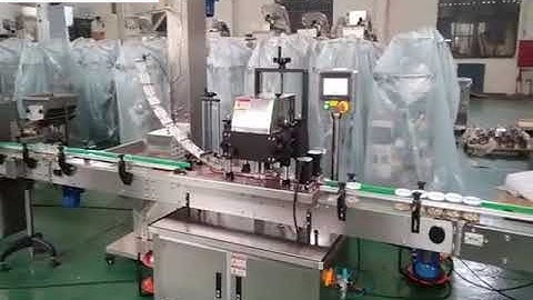 Automatic bottle cap positioning screw capping machine testing video