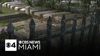 Artist works to restore faded names at historic Coconut Grove cemetery