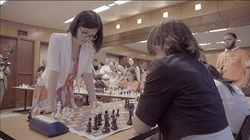 Yifan Hou on a Chess Player