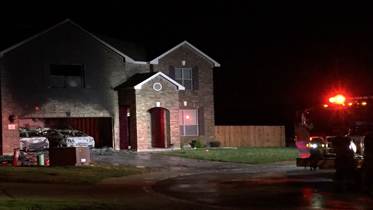 Two vehicles parked in garage burn in NW Bexar County house fire - YouTube