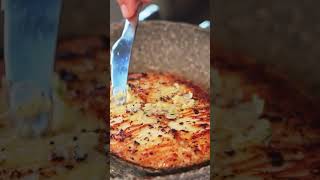 food | Putting a Butter on Top of a Frying Fish