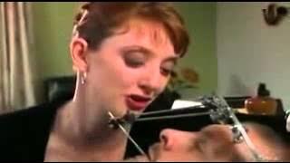 Torturing her disabled husband!