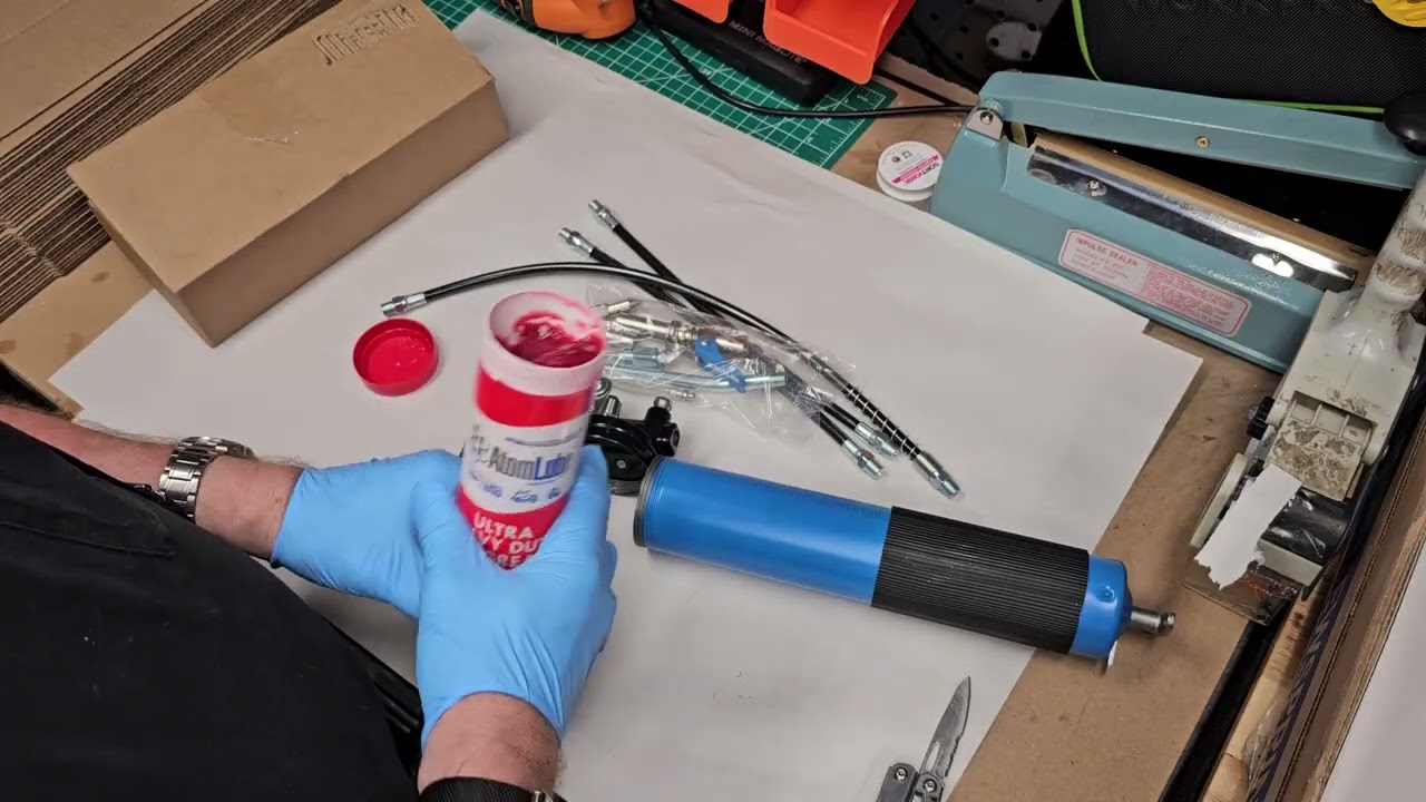How To Load & Use a Grease Gun, Kretlaw Grease Gun & Atom Lube Heady Duty Red Grease