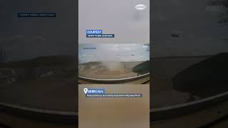 Dust devil tears through Derry dock, tossing around a paddle board and paddle boat #shorts