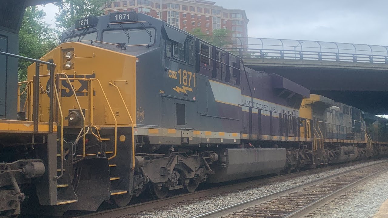 CSX X410-06 with ACL Heritage Unit Trailing and 4 MBTA Cars at rear ...