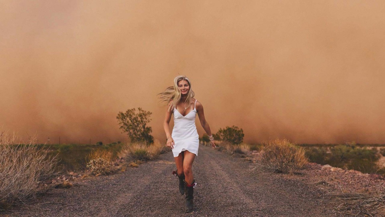 Aspiring Meteorologist Takes High School Graduation Photos With Epic Dust Storm