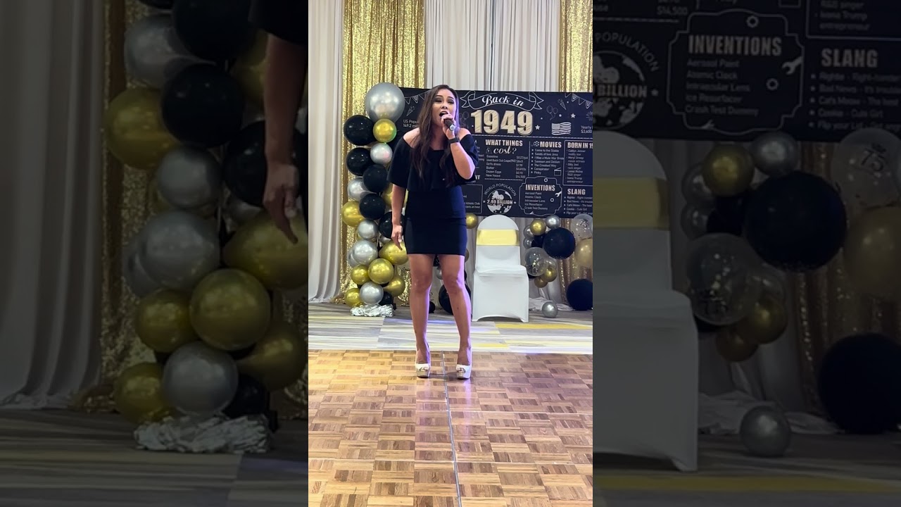 Jhac Khie sings One Moment in Time