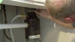 How to Fix a Garbage Disposal That Leaks