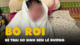 Bé trai sơ sinh bị bỏ rơi bên lề đường