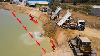 Excel Bulldozer And Dumper Truck at Work Project Road Widening Construction On Canal