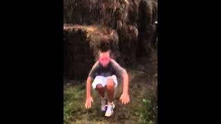 Kid fails jumping of haystack