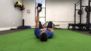 Supine Bottoms Up KB Corkscrew