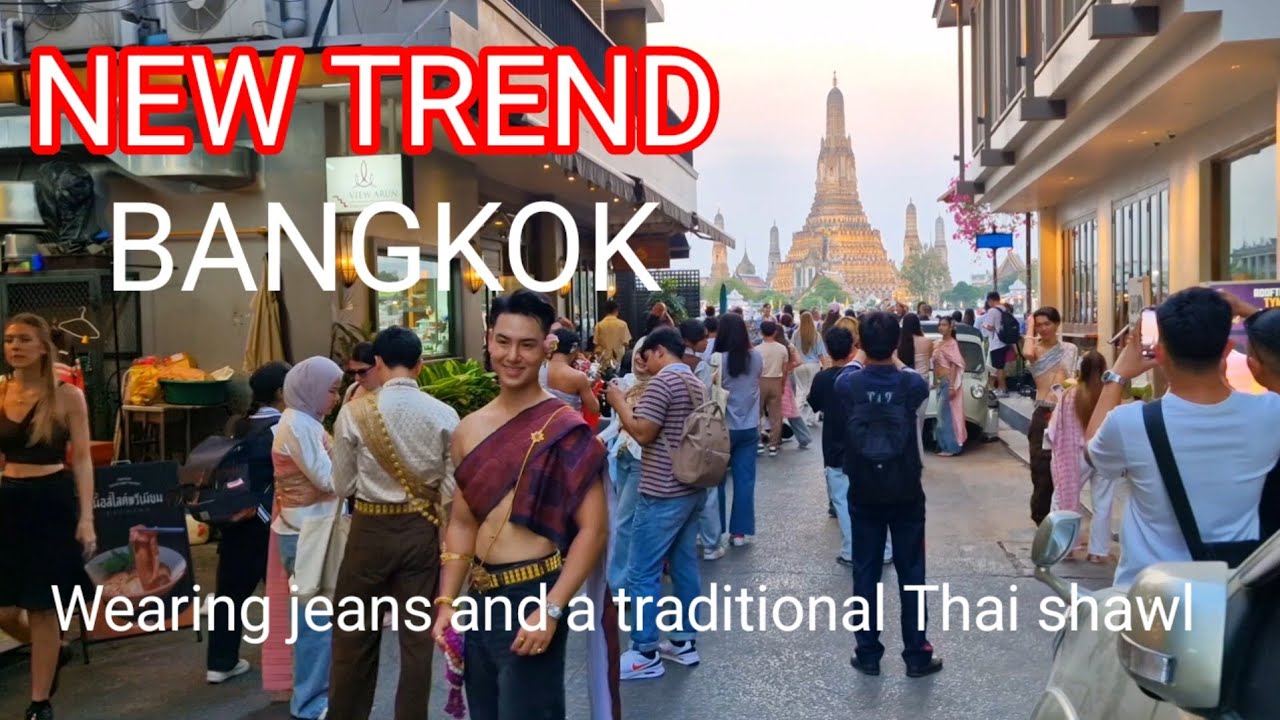 OMG!! สุดจะเชื่อกระแสมาแรงมาก Wearing jeans and a traditional Thai shawl (Sa-bai) ต่างชาติยังทึ่งเลย