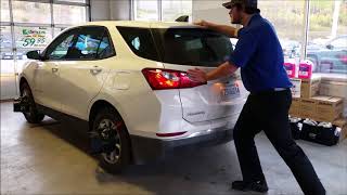 Service Drive Thru Alignment Check at Herron Chevrolet Buick GMC.