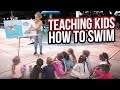 TEACHING KIDS HOW TO SWIM