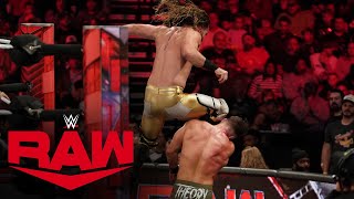 Seth "Freakin" Rollins delivers a devastating knee to Austin Theory