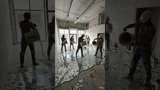 This high-tech time-lapse transformation showcases a raw concrete floor evolving  stunning luxury