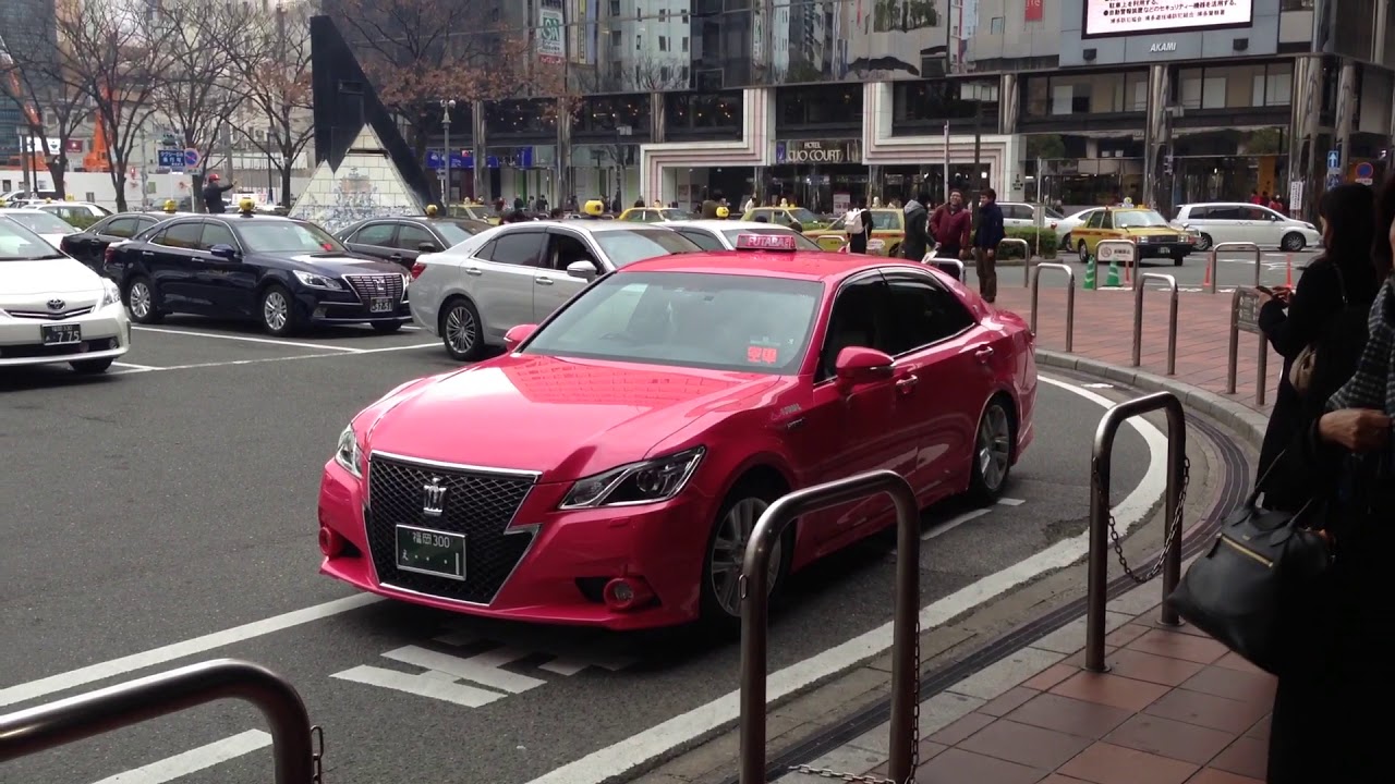 Pink taxi cab in Japan