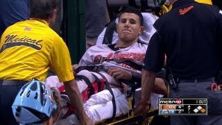 Machado injures knee, exits on stretcher