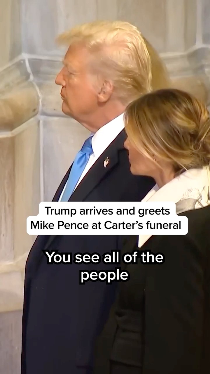 Trump arrives and greets Mike Pence at Carter's funeral