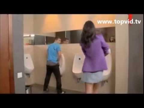 Naked and Funny Woman in Men's Toilet