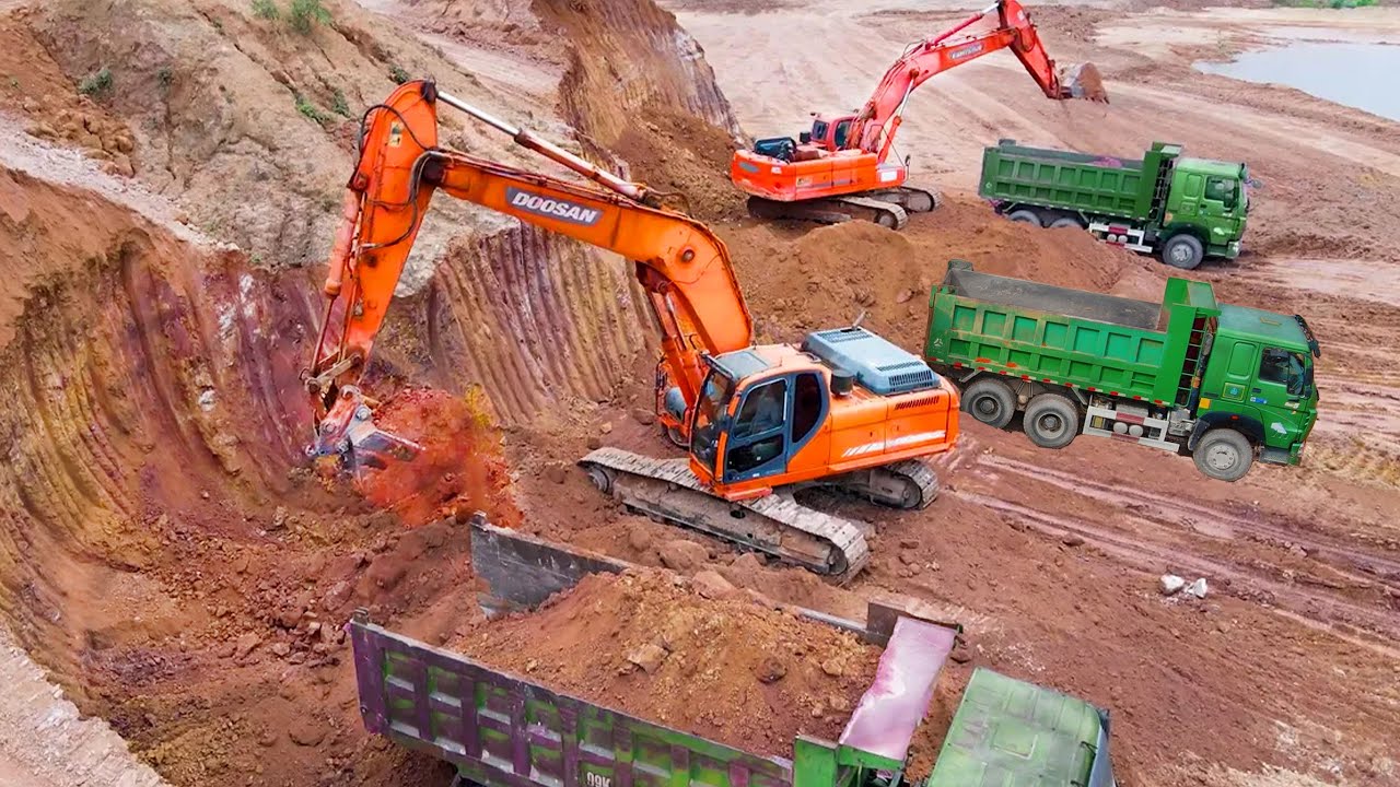 Excavator Loading MAN Trucks with Three Passes, KOMATSU & HITACHI Working on Construction Site - JCB