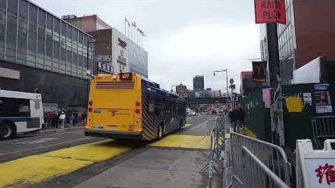 NYC Bus: Cambria Heights bound LFS Gen-4 8840 Q27 at Main St/Roosevelt Av