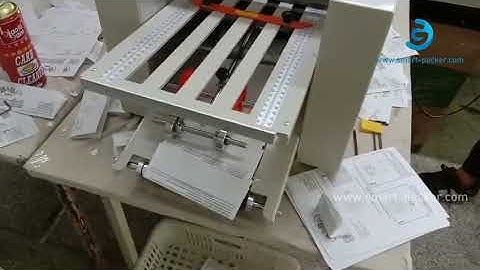 High speed manual leaflet sheet folding machine automatic paper sheet folding machine running video
