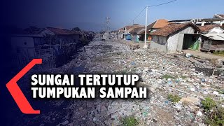 Sungai di Kampung Nelayan Tertutup Tumpukan Sampah