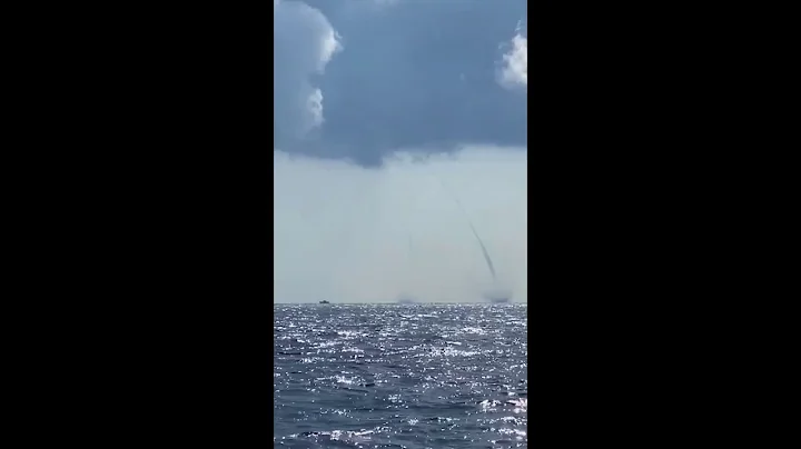 Dueling waterspouts in the Gulf of Mexico near Pan...
