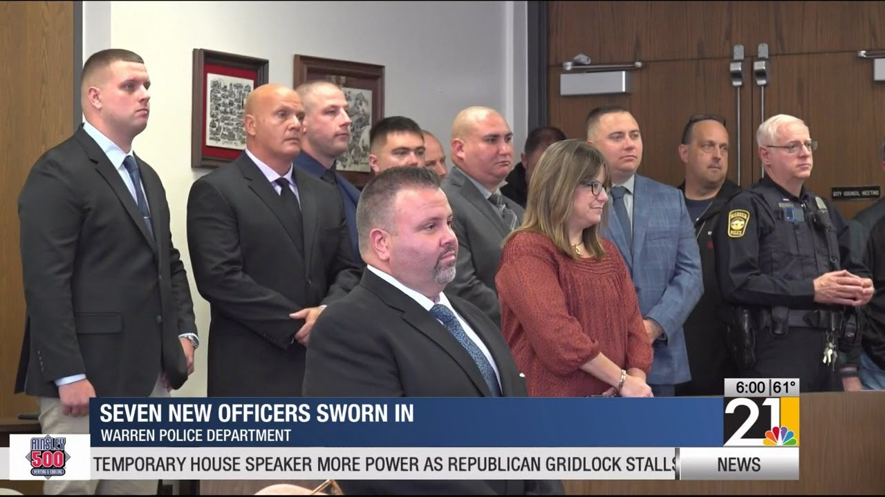 Seven new Warren officers sworn in - YouTube