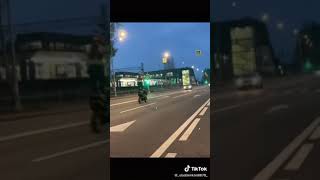 Scooter stunt at night road