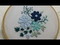 Hand embroidery of flowers with criss cross lazy daisy stitch