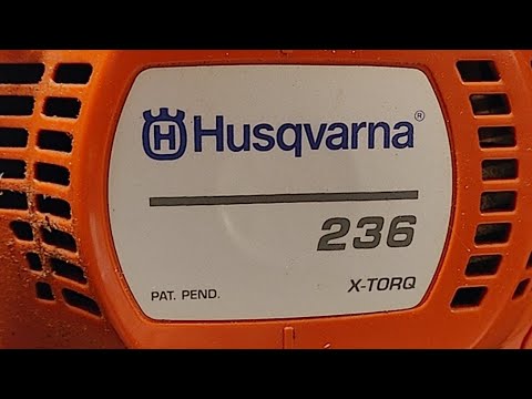 Videó: Hogyan lehet beállítani a porlasztót egy Husqvarna 235 láncfűrészen?