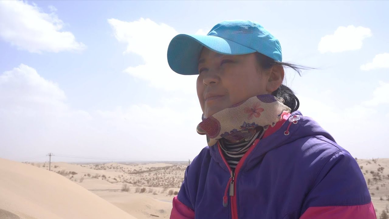 GLOBALink | Uygur woman plants trees in China's largest desert for 16 years