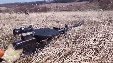 Pre-WW2 guns × inventive Ukrainians = Vintage DP-27 machine gun upgraded with optics and suppressor