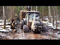 Valtra forestry tractor, John Deere 1110D and Timberjack 810B logging in wet conditions