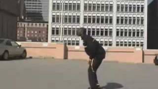 Kobe Bryant jumps over a speeding car (Aston Martin)