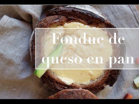 Bread bowl of fondue cheese