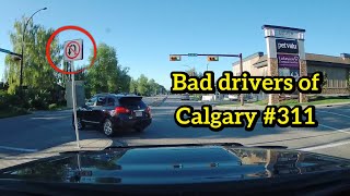 Bad Drivers of Calgary #311- Its not good blowing red lights in front of a truck