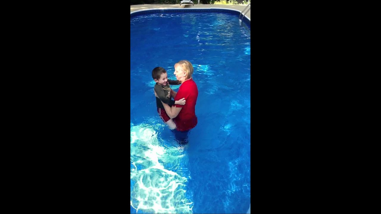 My mother and J-MAN having fun in the pool....fully clothed ;-)
