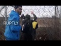 Turkey: Migrants cut through barbed wire at Greek border