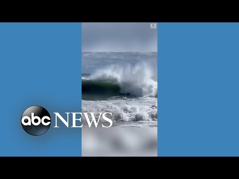 Massive waves crash into Rhode Island coast as Fiona moves north.