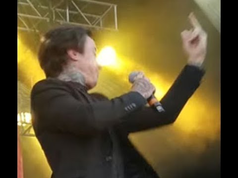 Ronnie Radke hit with flying beer can, then fingers crowd at Self Help Fest!