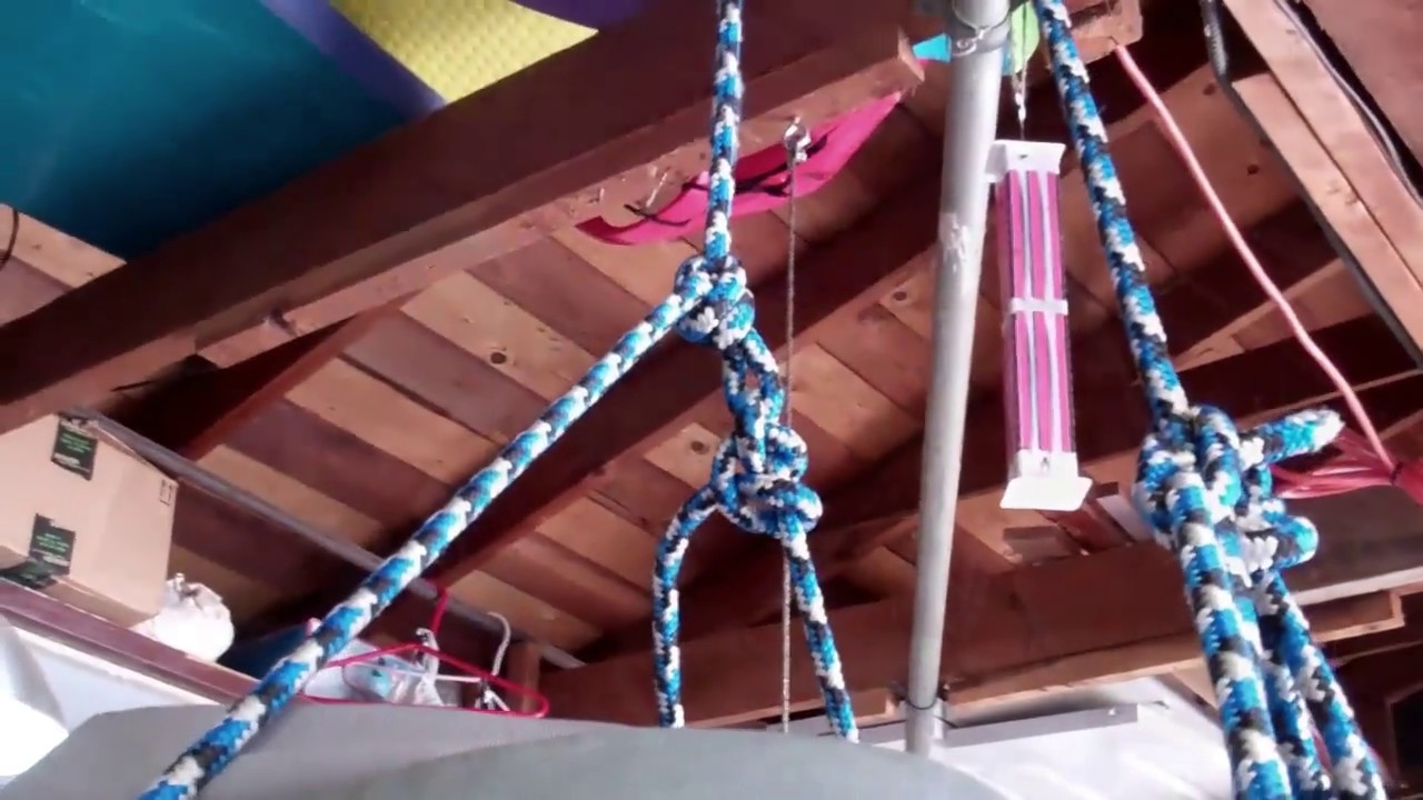 DIY Surfboard Storage for Longboard using Block w/Cam Cleat Idea